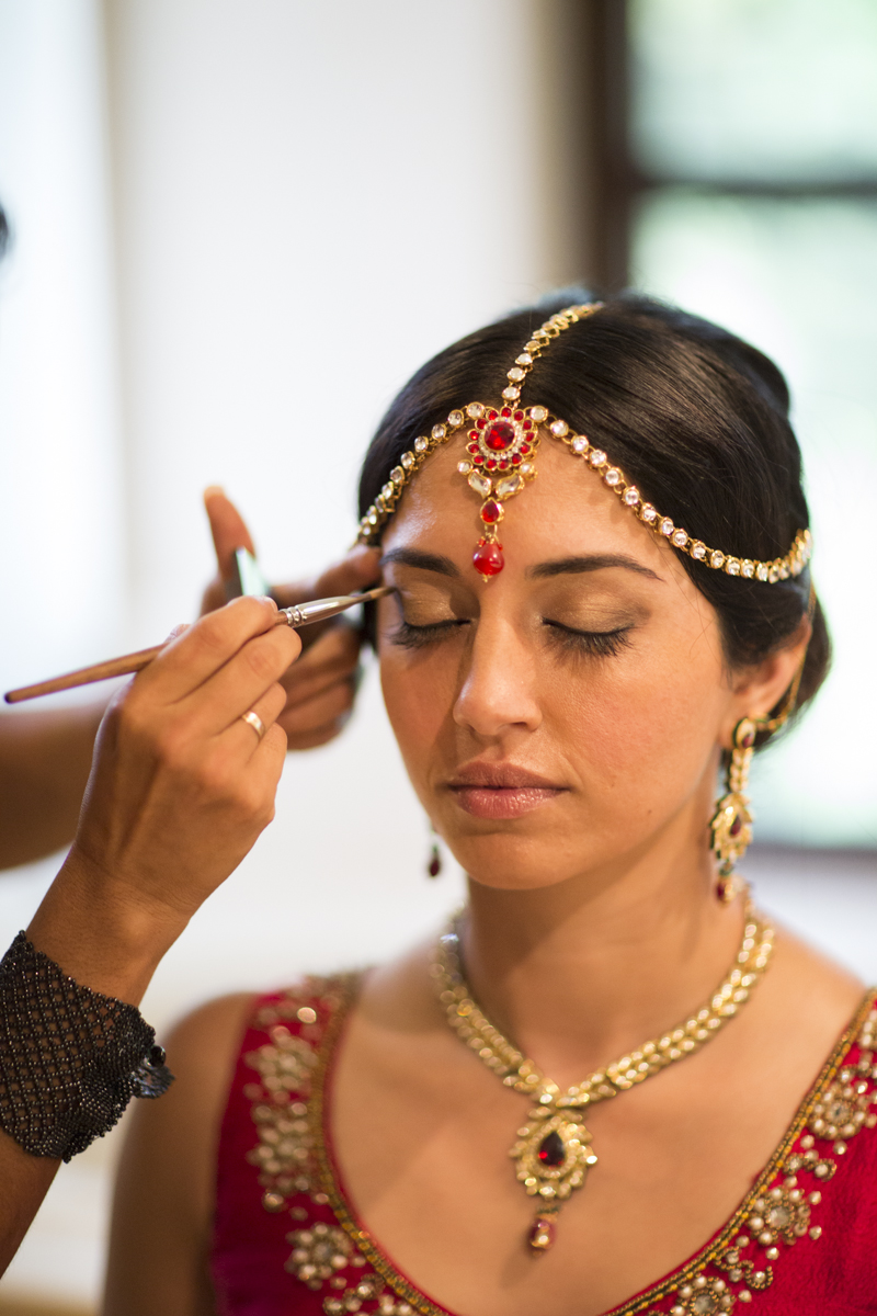 https://weddingscostarica.files.wordpress.com/2015/04/indian-bride-ruby-headpiece-bride-getting-make-up-headpiece-jewelry.jpg